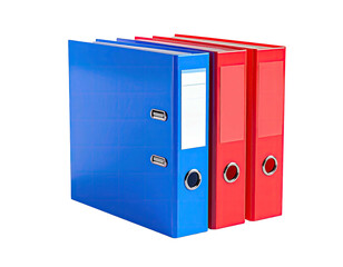 Stacked vibrant blue and red binders with blank label space, isolated