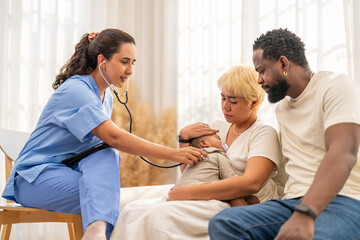 African baby health checkup with doctor pediatrician explaining results to parents, asian mother...
