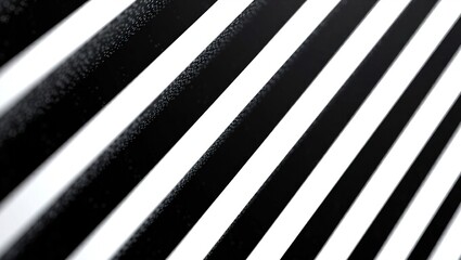 Abstract black and white diagonal stripes pattern.
