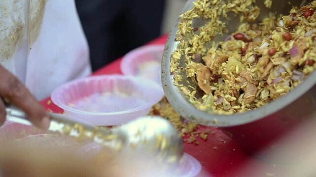 Spicy Indian snack Bhel puri. Quick Indian street food.