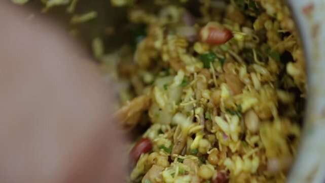 Spicy Indian snack Bhel puri. Quick Indian street food.