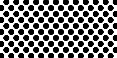 Monochrome polka dot pattern design. Black dots on white background creating classic geometric style. Perfect for graphic projects, decoration, or modern background use.