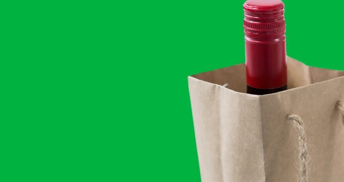 Wine bottle in a paper bag against copy space on transparent background - Powered by Adobe