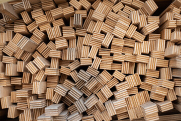 Not the usual texture background made of wood and plywood. Solid texture of the end of the slats cut from plywood. High quality photo