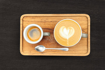 Overhead shot of espresso and latte with art, flat lay, top view