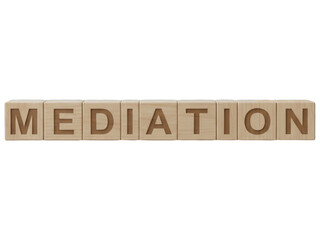 MEDIATION" spelled out in wooden blocks, isolated on black background