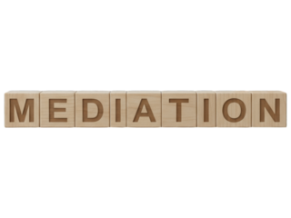 MEDIATION" spelled out in wooden blocks, isolated on black background