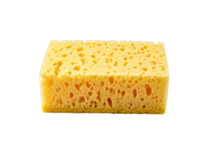Yellow sponge block, porous, rectangular, against black