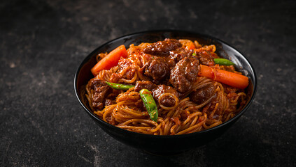Savory beef noodles with carrots and peppers stewed beef