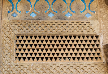 A triangular ventilation grateat at the ancient hill fort of Gwalior. Majestic Gwalior Qila, Madhya Pradesh, India.