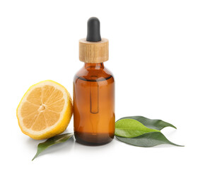 Bottle of lemon essential oil isolated on white background, closeup