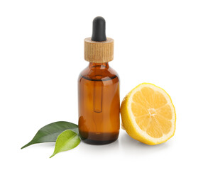 Bottle of lemon essential oil isolated on white background, closeup