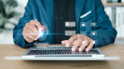 Deepfake detection and AI technology concept. Businessman using laptop and digital facial recognition interface for cybersecurity and identity verification.