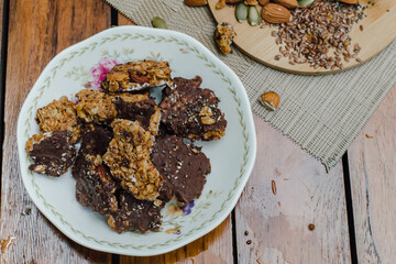 Organic chocolate granola with mixed nuts, top view.