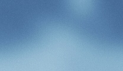 Close-up texture of blue denim fabric with subtle gradient, showcasing woven threads and a slightly faded appearance. Noise background. Gradient texture background