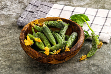 Raw gherkin cucumbers in the bowl
