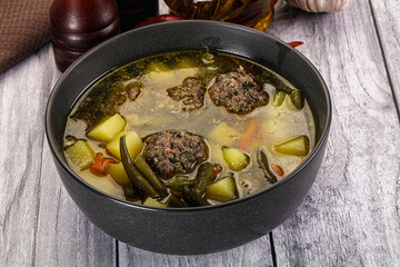 Soup with beef meatballs and vegetables