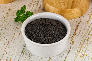 Black dry Nigella seeds in the bowl