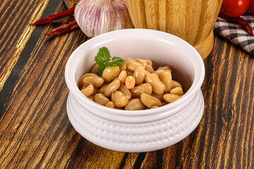 Baked white canned beans in the bowl
