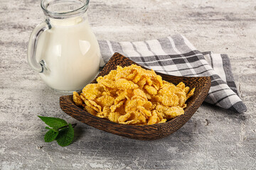 Corn flakes with milk for breakfast