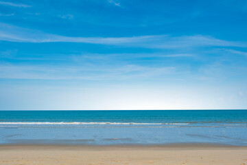Nature of the ocean and blue sky Summer with sunshine, sandy beaches, clear blue waters sparkling against the blue sky. on an island with good ecology and environment Background for summer vacation