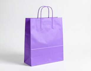 Simple purple gift bag with handles stands against a clean white background.