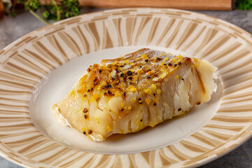 Steamed cod fish fillet with spices