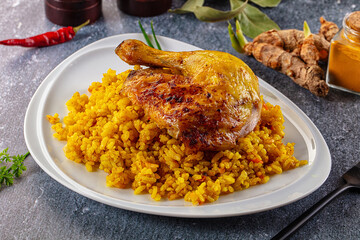 Roasted chicken leg with yellow rice