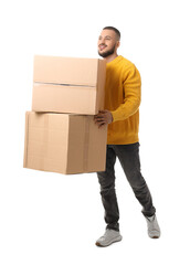Young man carrying cardboard boxes on white background