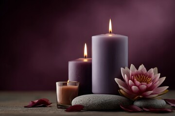 A serene arrangement of candles and a lotus flower on smooth stones, set against a soft purple background, evoking tranquility and relaxation.