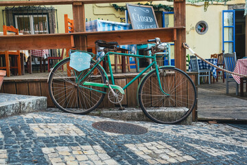 Retro Bicycle in Front of European Restaurant