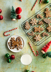 Festive gingerbread cookies with milk and ornaments