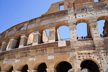 Obraz premium Arches, new and old, at the Roman Colosseum