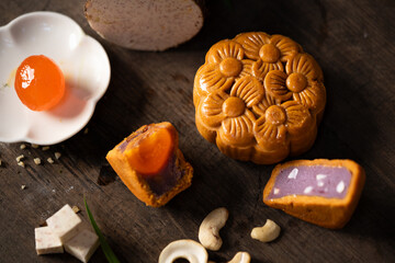 Taro mooncake with salted egg yolk and cashew nuts