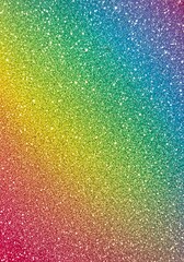 Vibrant, full-spectrum rainbow gradient abstract background made from thousands of sparkling glitter particles