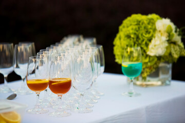 Wine and transparent glasses on the table
