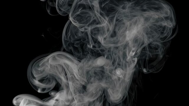 Abstract image of wispy, white smoke rising against a deep black background. The ethereal smoke forms dynamic shapes