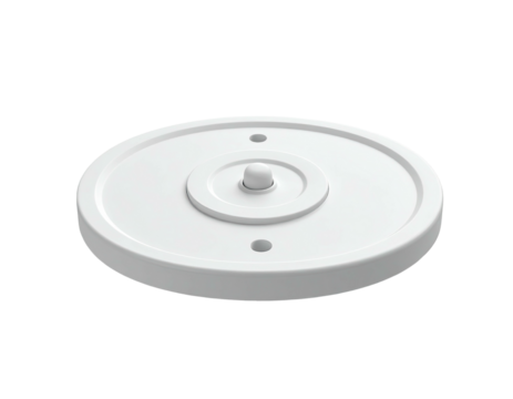 White, circular object with central knob and two small holes, isolated on black