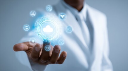 Person in white coat holding a glowing cloud computing interface with digital icons