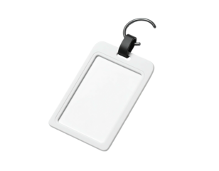 A white luggage tag with a black strap and metal loop, isolated on black