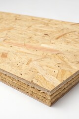 OSB board on white background showcasing natural texture and layered structure for construction and design use