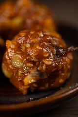 Close up of traditional Vietnamese mooncake mixed filling with salted egg yolk and nuts