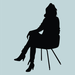 Elegant Woman Sitting on a Chair Silhouette