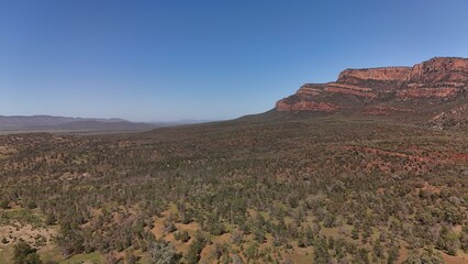 Aerial Image of Flinders Ranges, South Australia &ndash; Majestic Outback Landscape of Red Rock Formations, Panoramic Mountain Ridges, Forest, Vast Plains in Australia Inland
