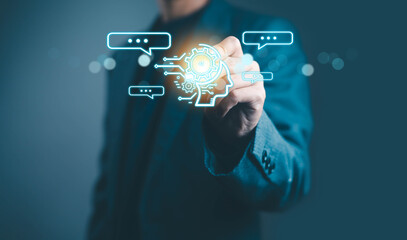 Businessman touching virtual AI head interface with gear and chat icons, representing artificial intelligence, data analytics, digital communication, and innovation in smart technology for automation.