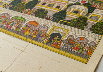 Fototapeta premium Exquisite Rajasthani miniature painting depicting a vibrant historical procession with elephants and figures, meticulously hand-painted on textured old paper.