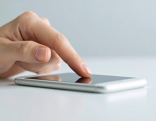 スマートフォンを指でタッチしたシーン