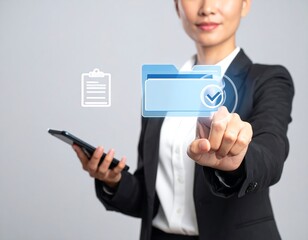 Woman with folder icon interacting with a file management system using technology, business casual attire against grey background