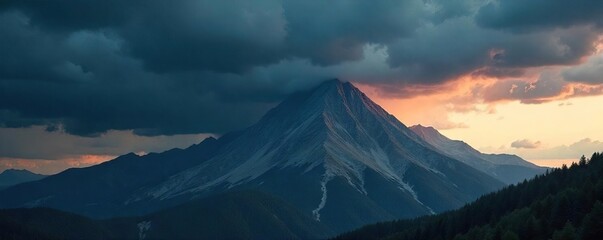 Dramatic Storm Clouds Gathering Over Mountain Peak, Casting Long Shadows Across the Landscape