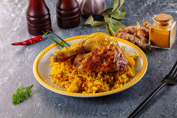 Roasted chicken leg with yellow rice